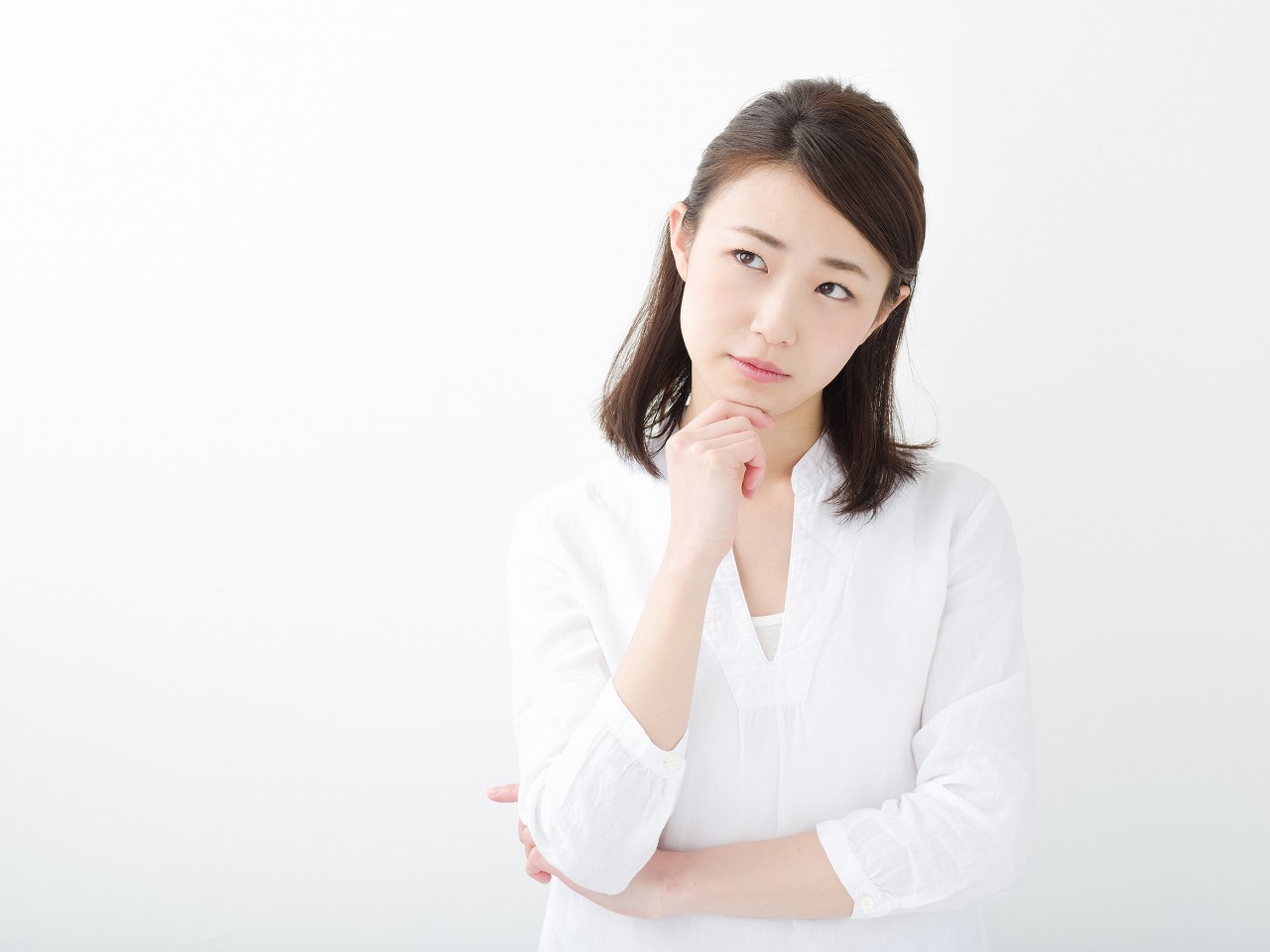 悩み顔の女性